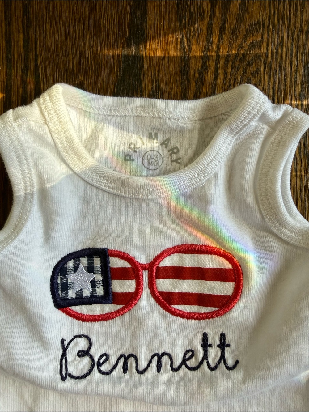 Primary White Tank Bodysuit with Red and Navy Sunglasses Applique